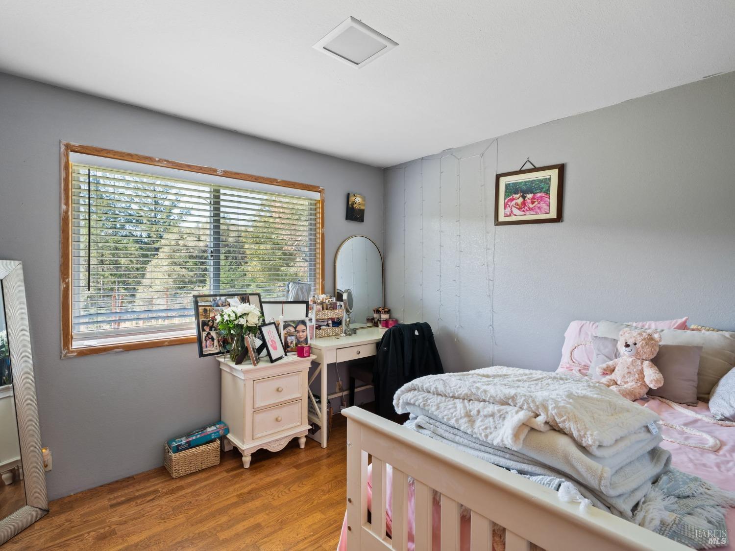 1550 Guntly Road Philo, CA 95466 - Photo 17 of 23 a bedroom with a bed and a window