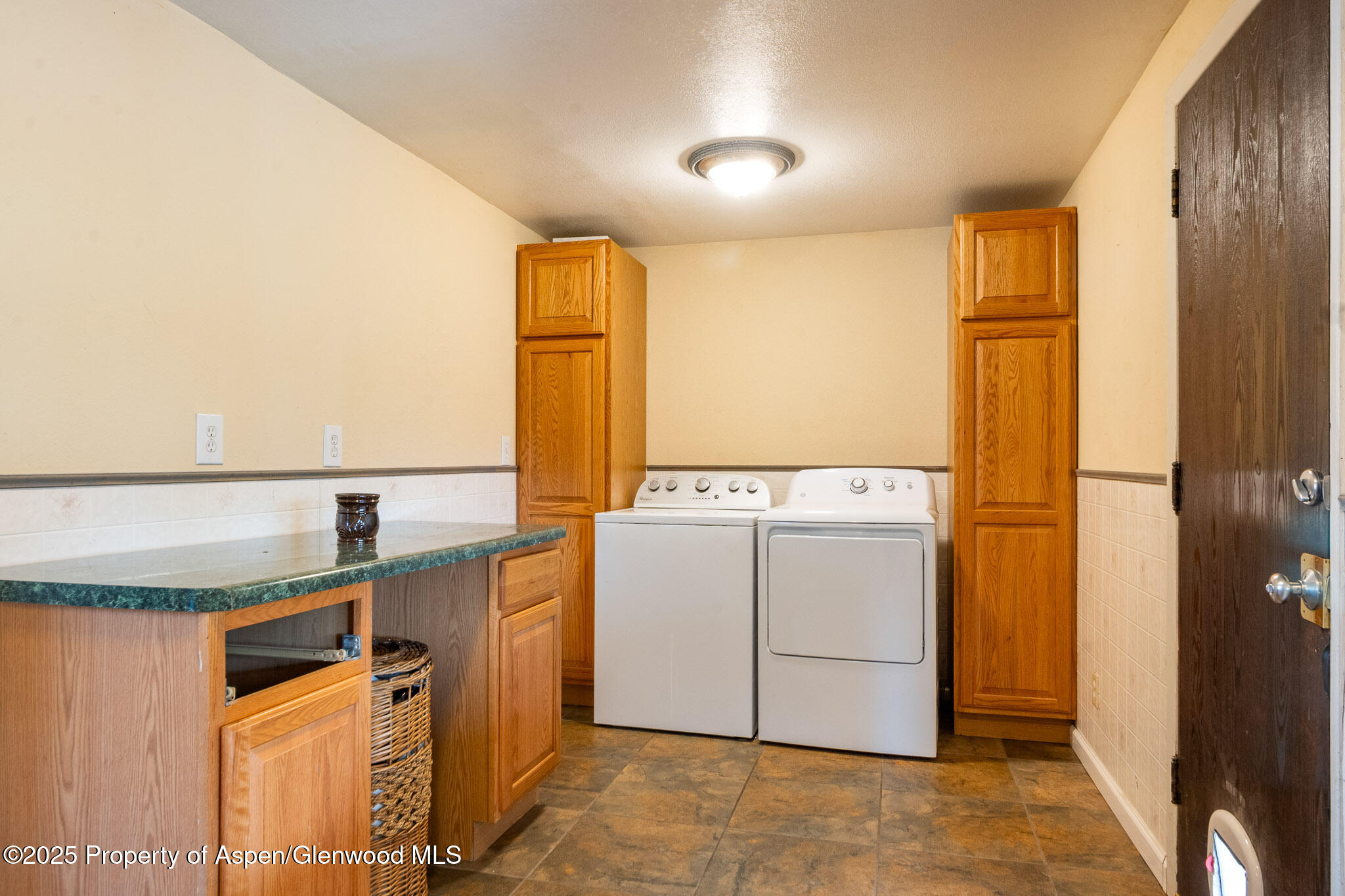 125 East 9th Street Rifle, CO 81650 - Photo 23 of 29 a utility room with dryer and washer