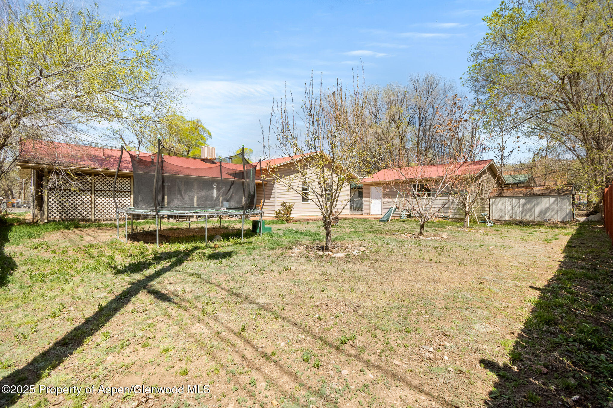 125 East 9th Street Rifle, CO 81650 - Photo 27 of 29 a view of a swimming pool with a patio