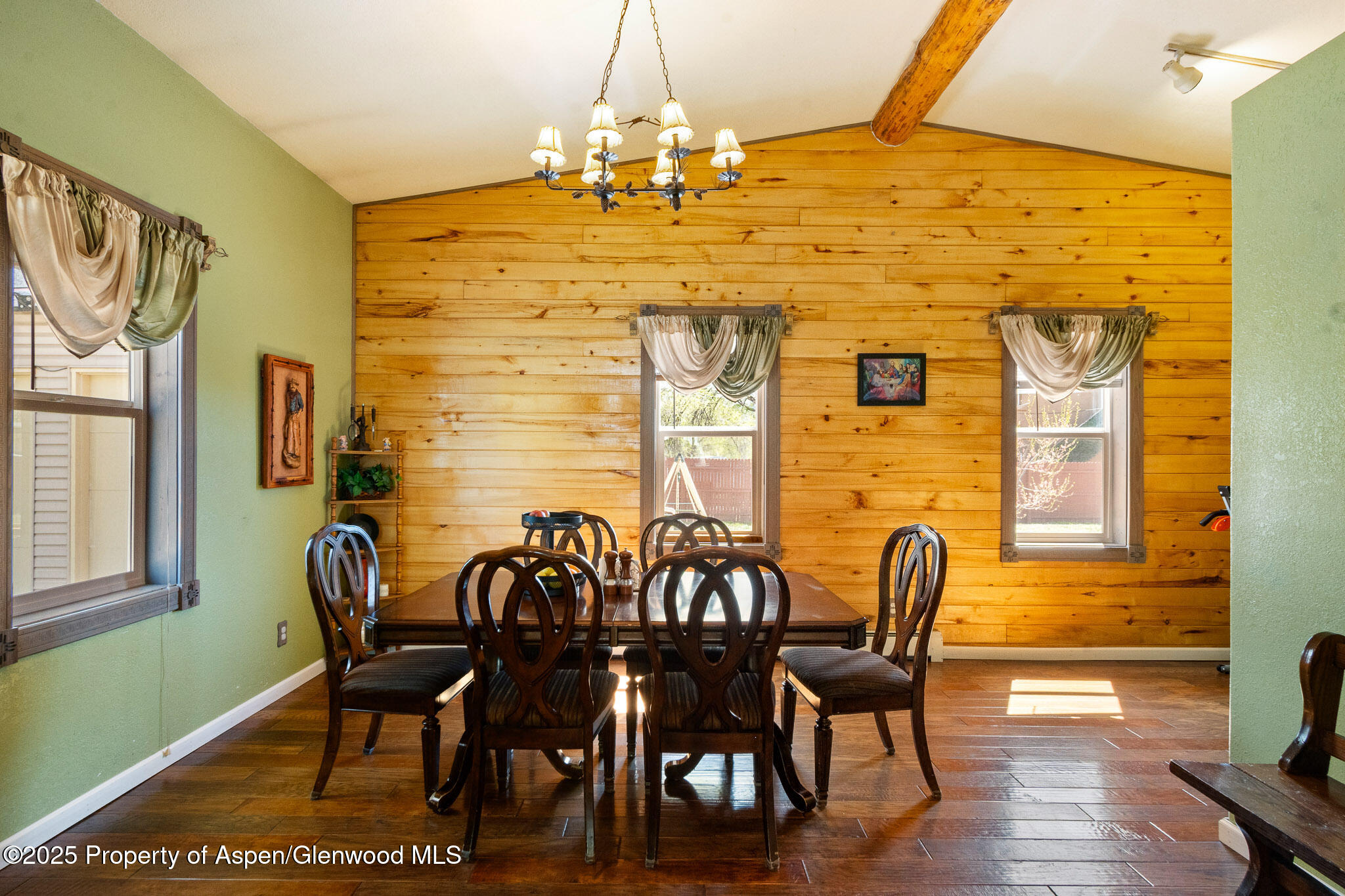 125 East 9th Street Rifle, CO 81650 - Photo 8 of 29 a view of a dining room with furniture and wooden floor
