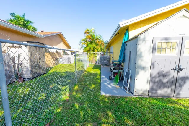 a view of a back yard of the house