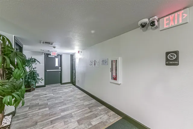 a view of a hallway with entryway