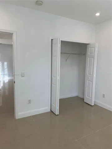 an empty room with window