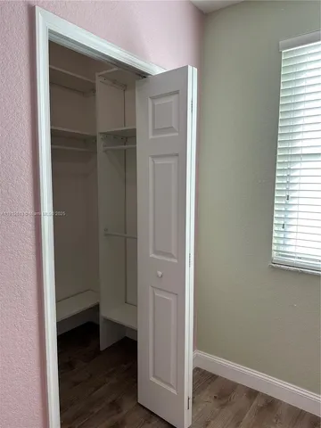 a room with table and window