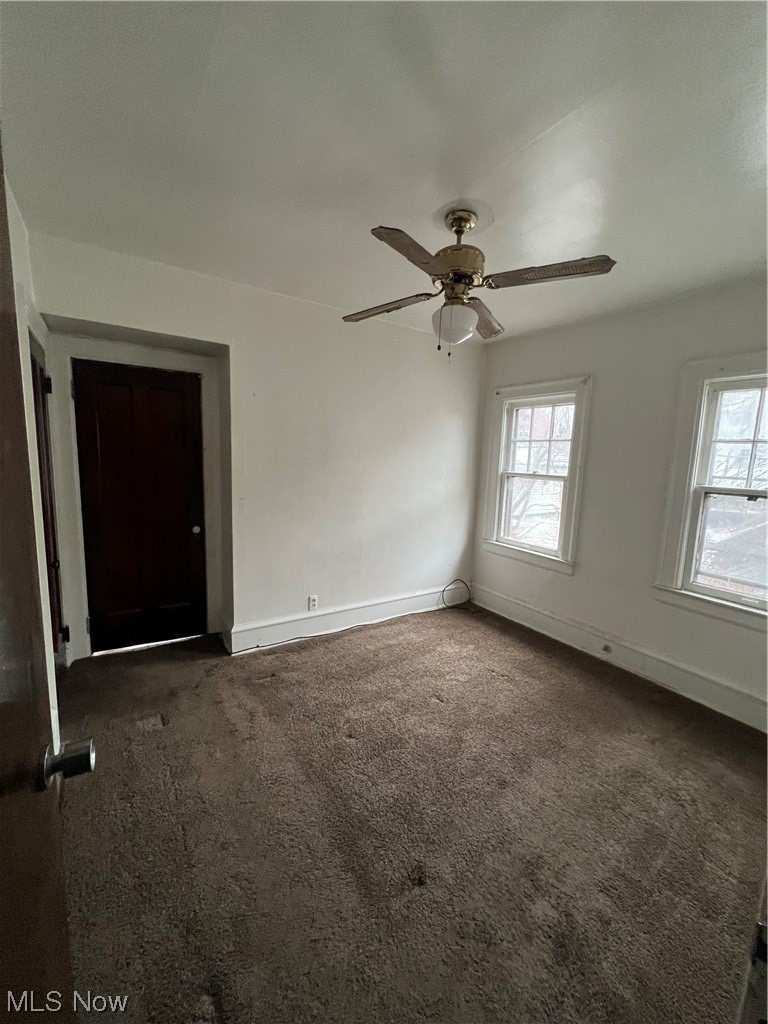 1717 Compton Road Cleveland Heights, OH 44118 - Photo 20 of 24 Carpeted spare room with ceiling fan and a healthy amount of sunlight