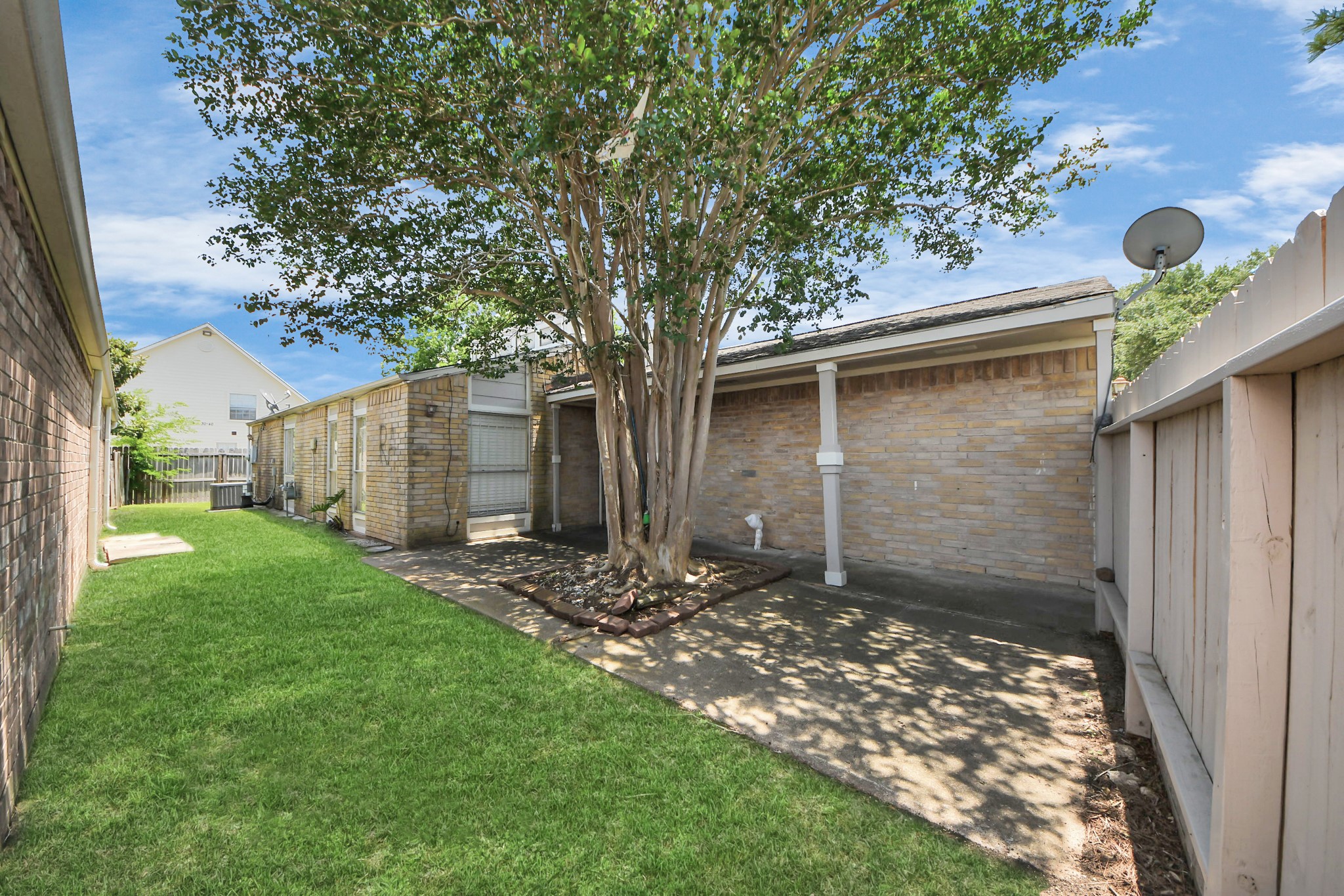 4155 Amir Street Houston, TX 77072 - Photo 7 of 43 a backyard of a house with lots of green space