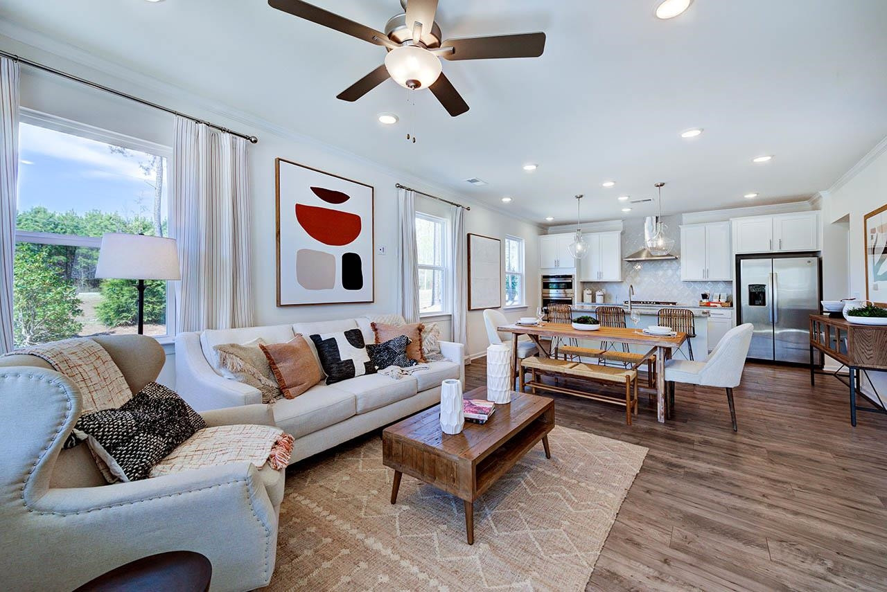 1714 Wimberly Road Apex, NC 27523 - Photo 2 of 45 a living room with furniture kitchen view and a large window