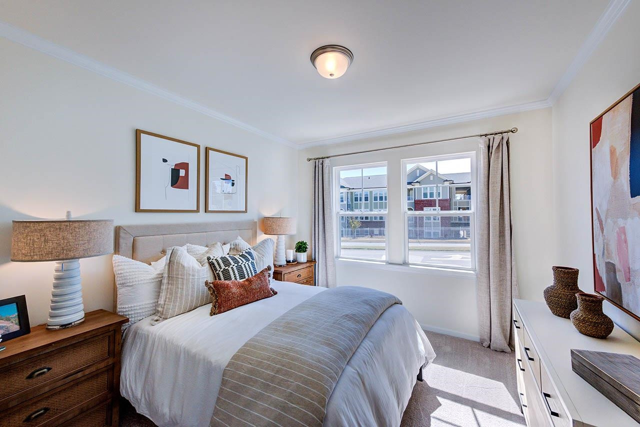 1714 Wimberly Road Apex, NC 27523 - Photo 21 of 45 a bedroom with a bed and a window