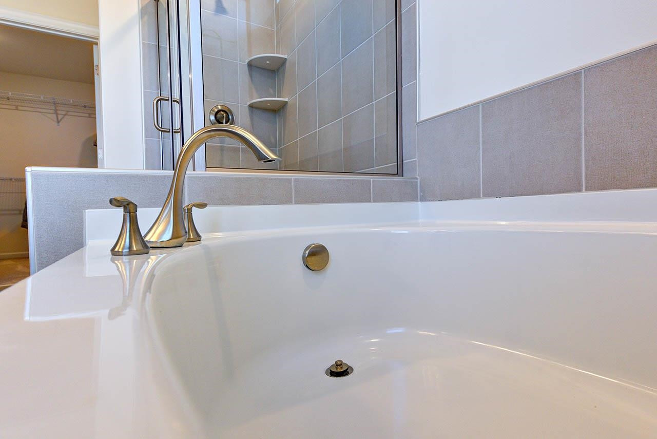 1714 Wimberly Road Apex, NC 27523 - Photo 26 of 45 a bathroom with a sink