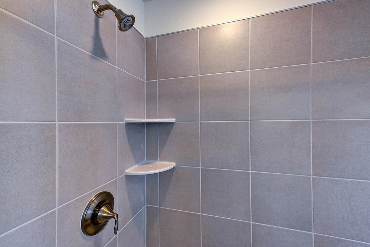 1714 Wimberly Road Apex, NC 27523 - Photo 28 of 45 a bathroom with a shower