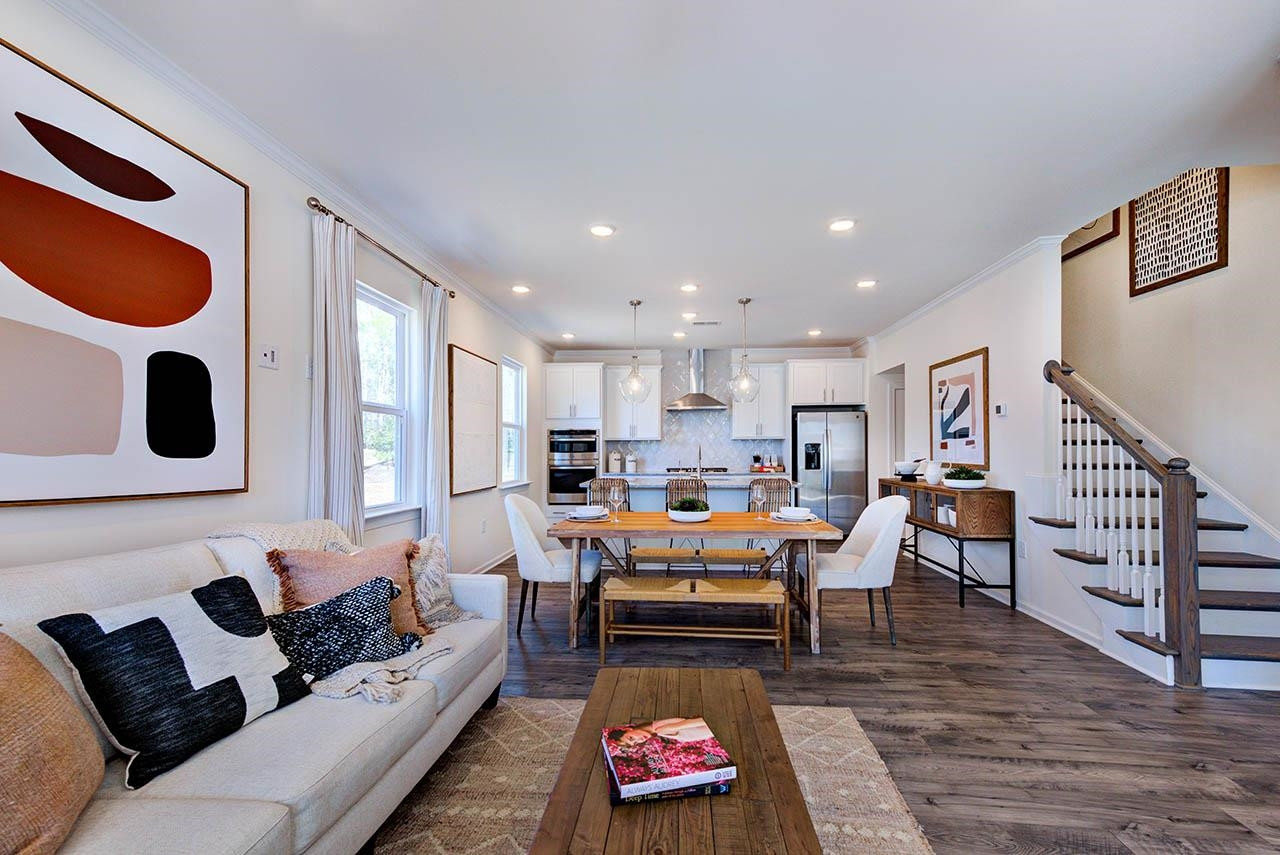 1714 Wimberly Road Apex, NC 27523 - Photo 3 of 45 a living room with furniture and a rug