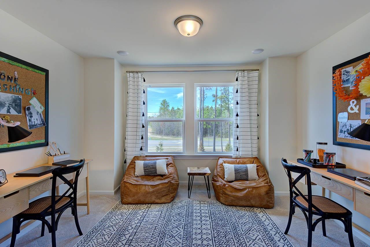 1714 Wimberly Road Apex, NC 27523 - Photo 33 of 45 a room with furniture and a window