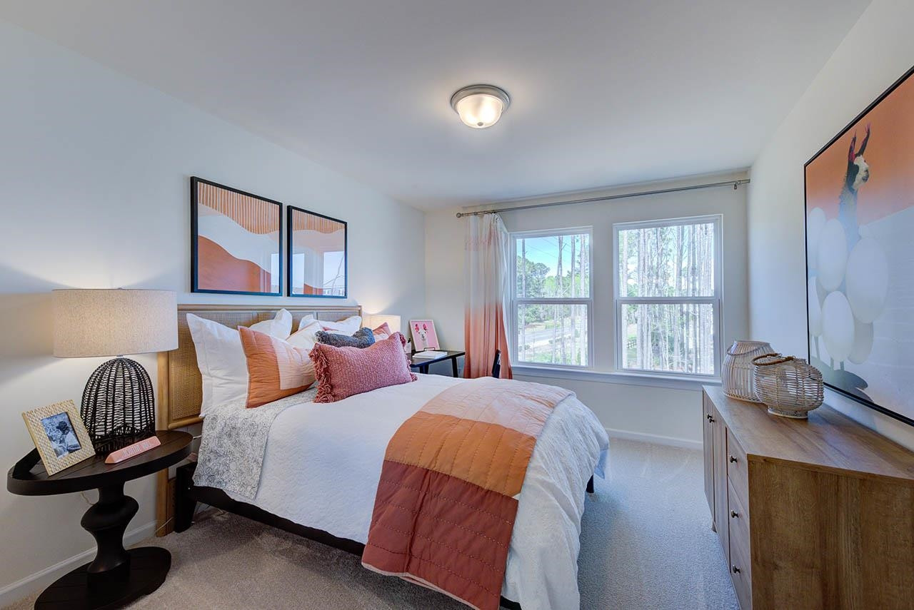 1714 Wimberly Road Apex, NC 27523 - Photo 42 of 45 a bedroom with a bed and a window