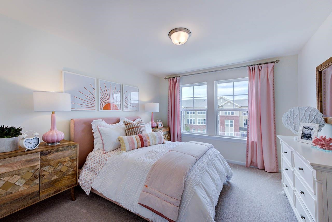 1714 Wimberly Road Apex, NC 27523 - Photo 44 of 45 a bedroom with a bed and a window