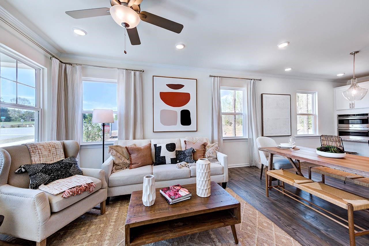 1714 Wimberly Road Apex, NC 27523 - Photo 8 of 45 a living room with furniture and a large window