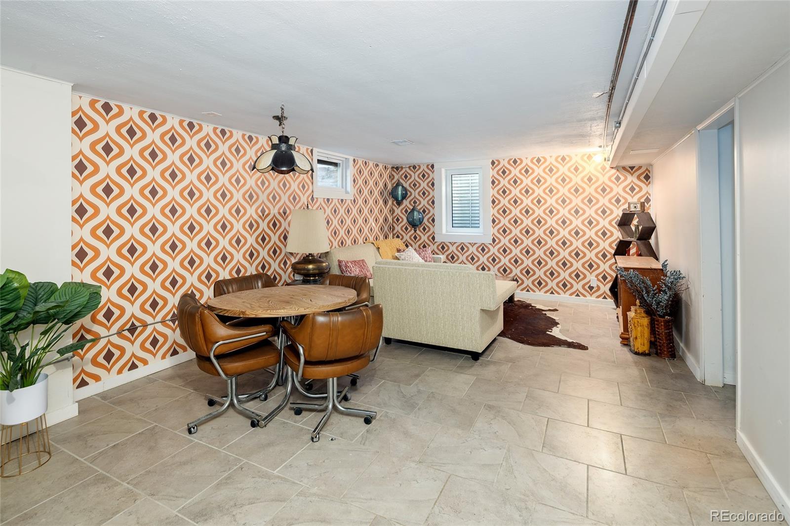1550 South Forest Street Denver, CO 80222 - Photo 30 of 38 a view of a livingroom with furniture and a window