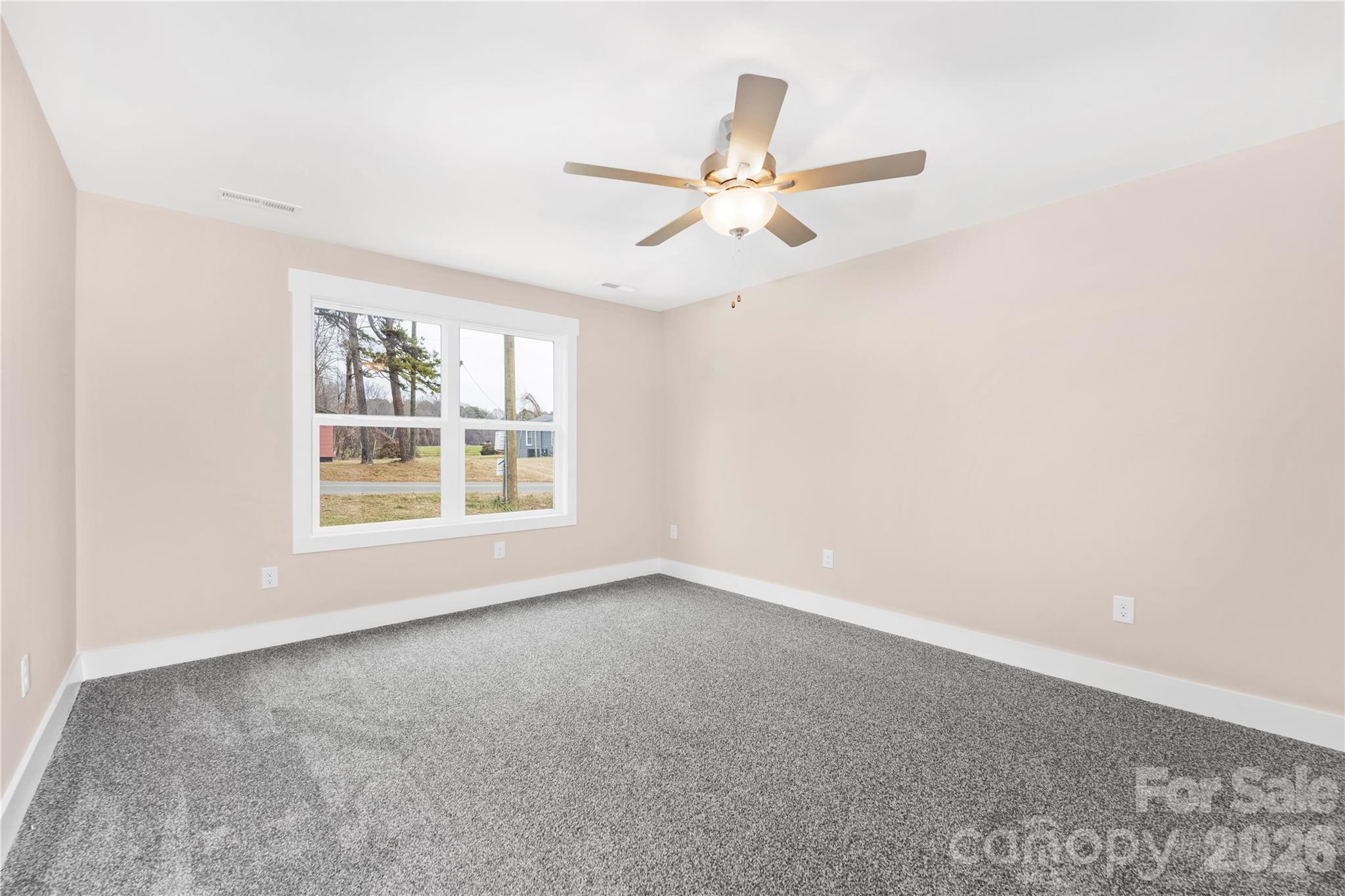 407 Queens Road Gastonia, NC 28052 - Photo 16 of 34 a view of an empty room with a window