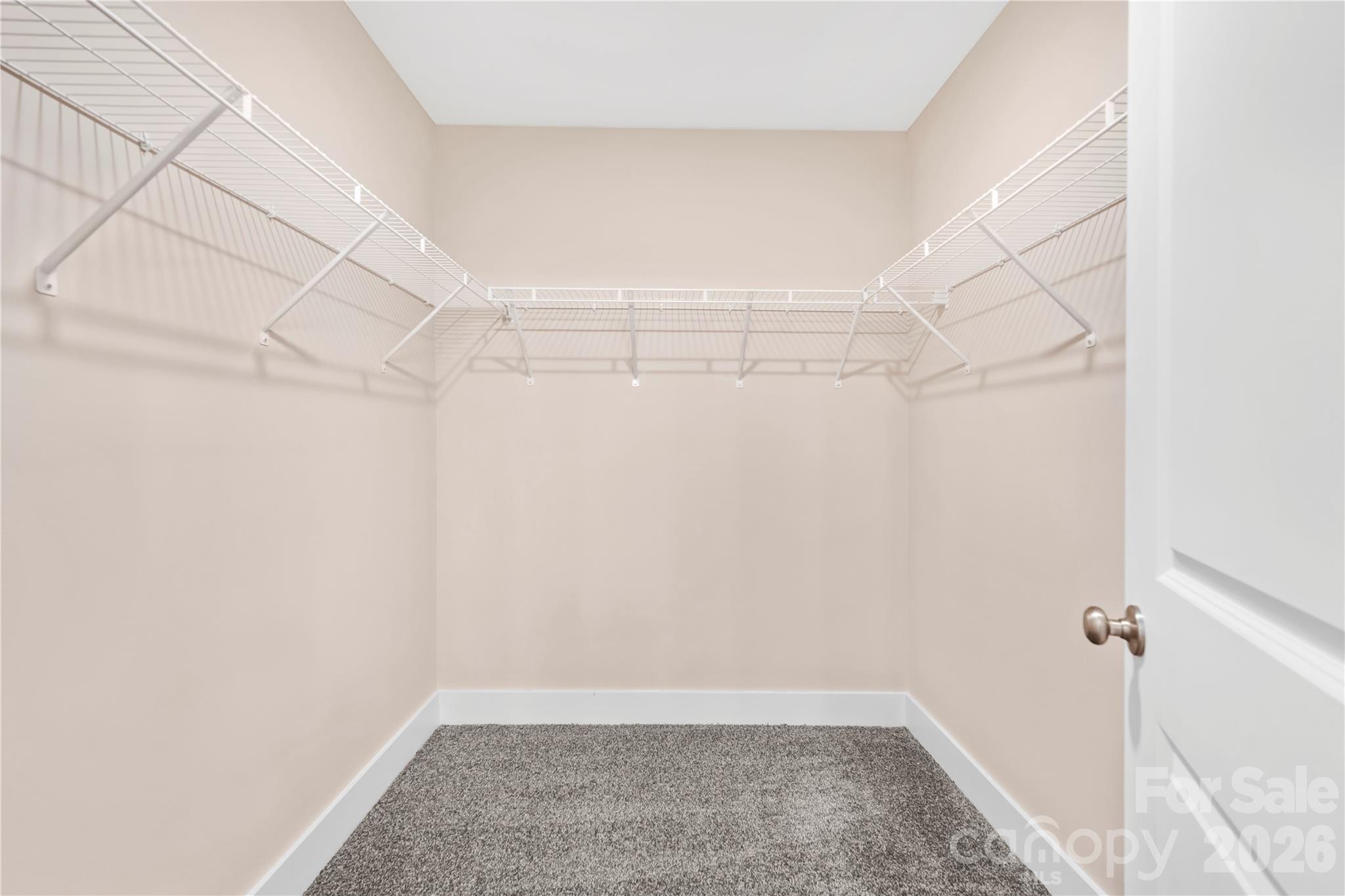 407 Queens Road Gastonia, NC 28052 - Photo 21 of 34 a view of a room with racks on the wall
