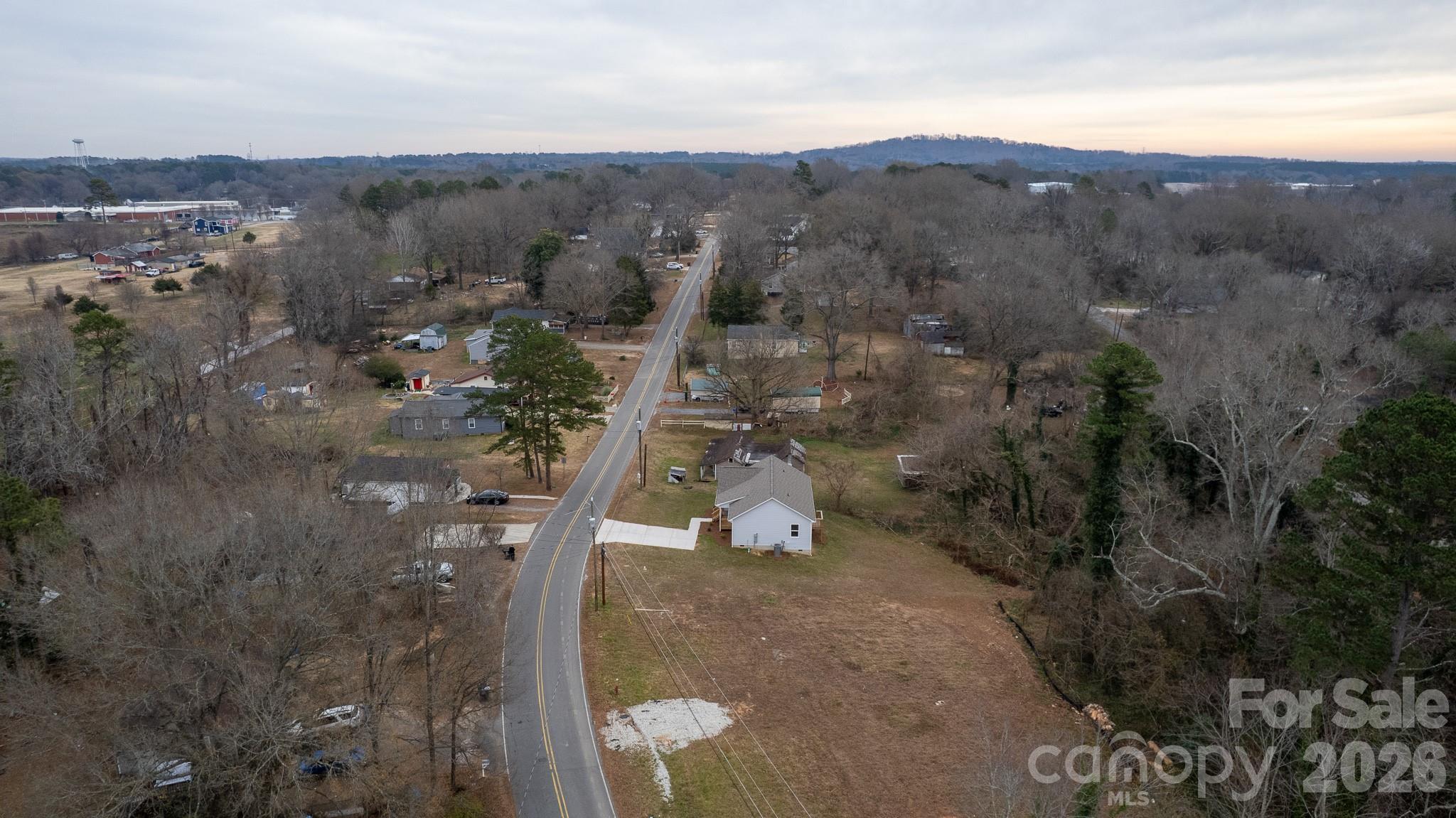 407 Queens Road Gastonia, NC 28052 - Photo 29 of 34 an aerial view of houses with outdoor space