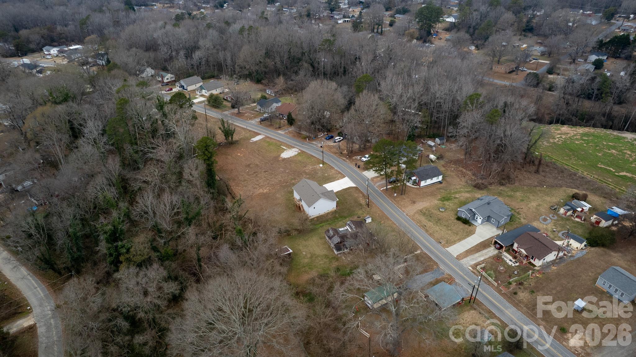 407 Queens Road Gastonia, NC 28052 - Photo 30 of 34 an aerial view of a house with a yard