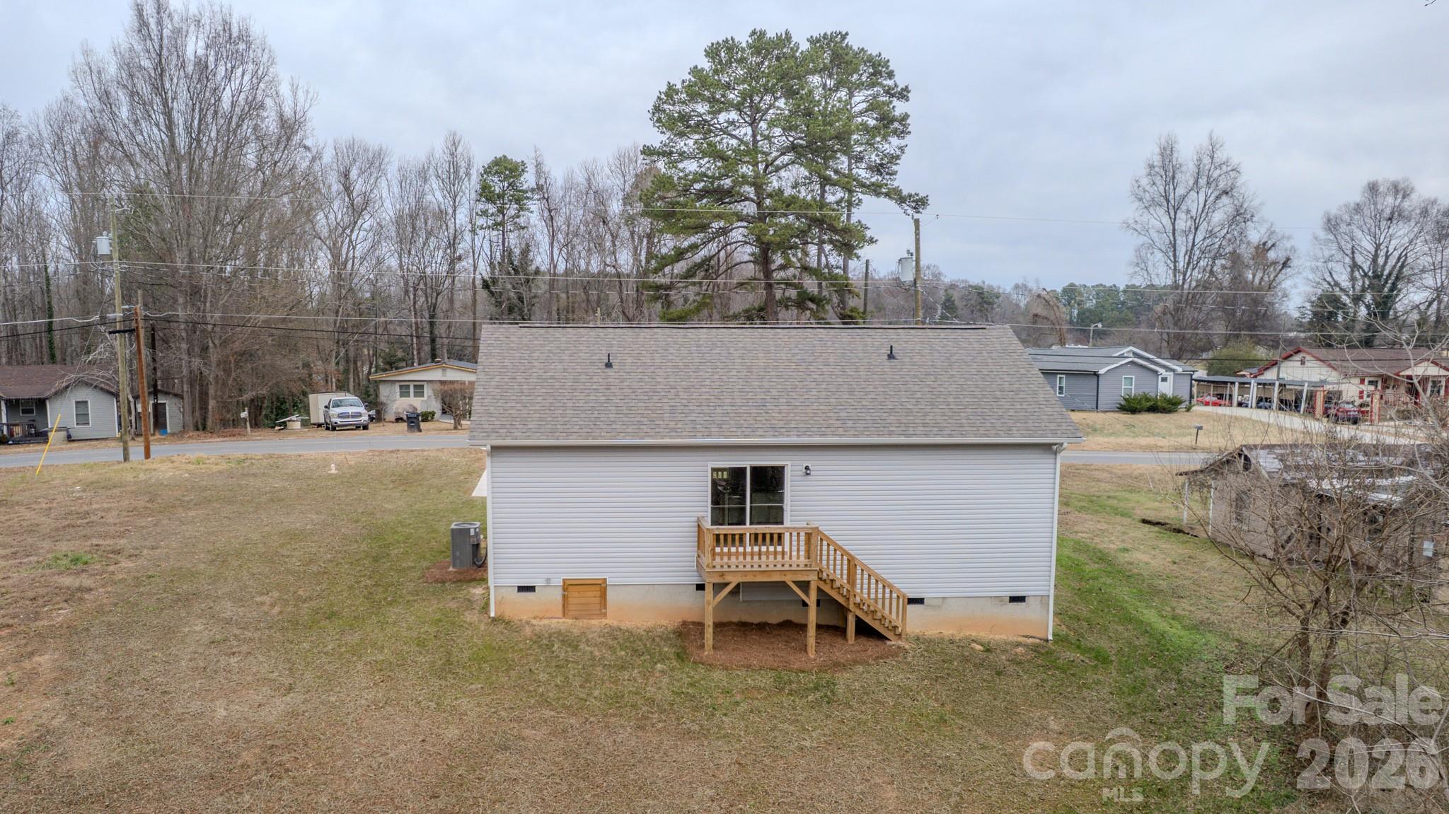 407 Queens Road Gastonia, NC 28052 - Photo 33 of 34 a view of a house with a patio
