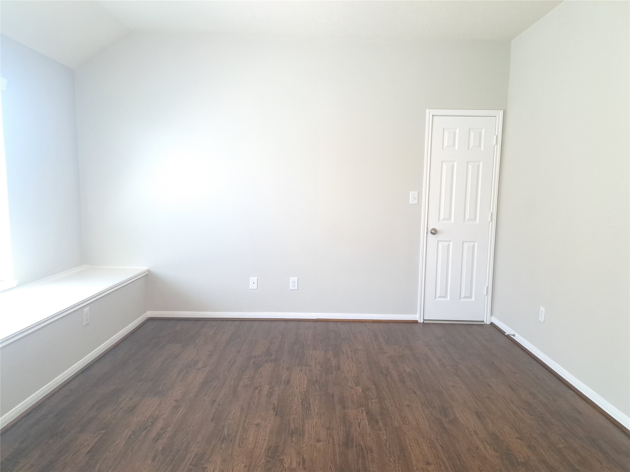 26315 Fox Ridge Lane Katy, TX 77494 - Photo 36 of 39 a view of an empty room with wooden floor and a window