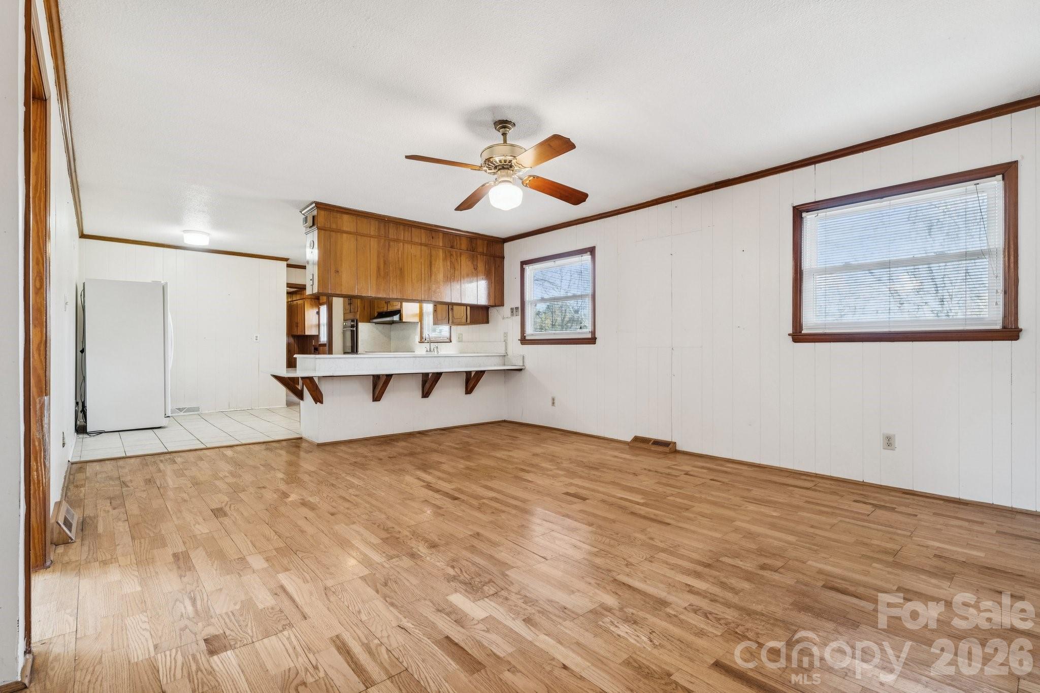 9525 Brief Road Charlotte, NC 28227 - Photo 13 of 46 a view of a kitchen with a sink and a refrigerator