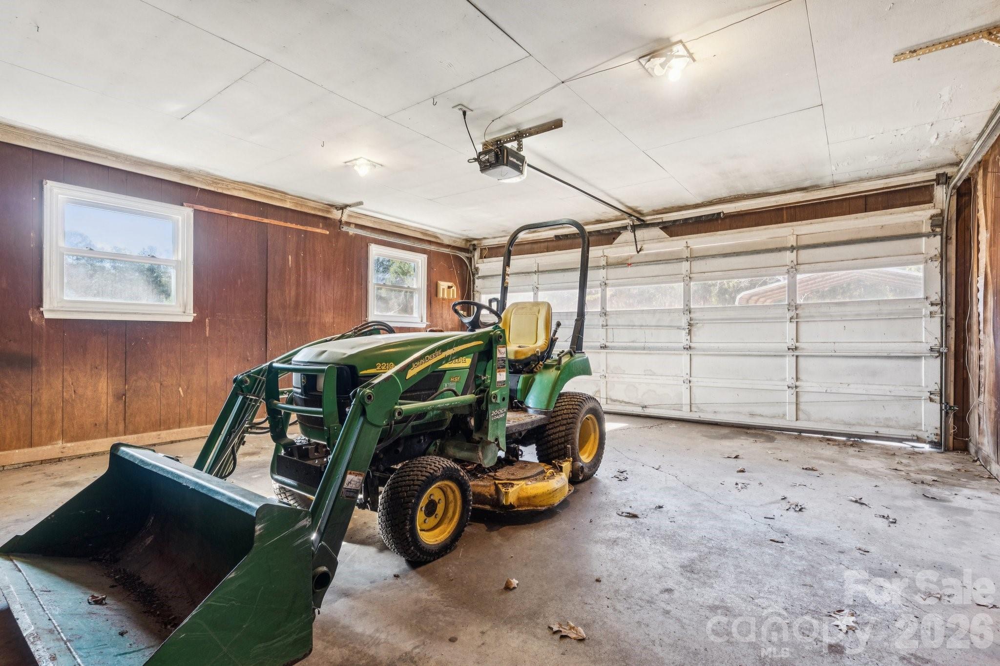 9525 Brief Road Charlotte, NC 28227 - Photo 22 of 46 a car parked in a garage