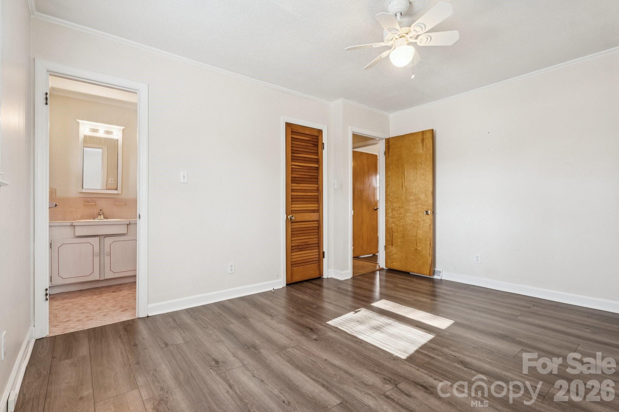 9525 Brief Road Charlotte, NC 28227 - Photo 27 of 46 a view of an empty room with wooden floor and a window
