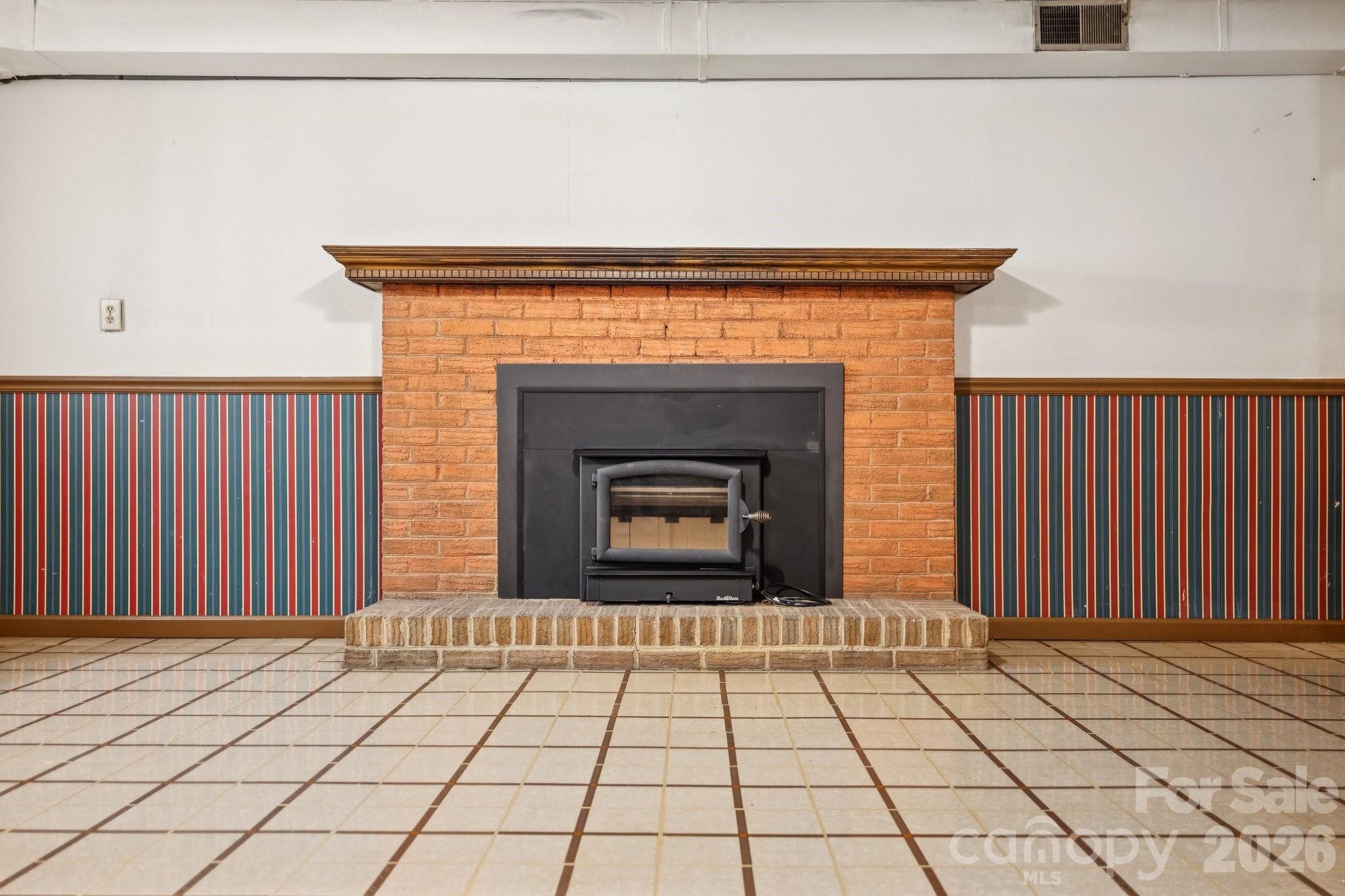 9525 Brief Road Charlotte, NC 28227 - Photo 36 of 46 a living room with a fireplace