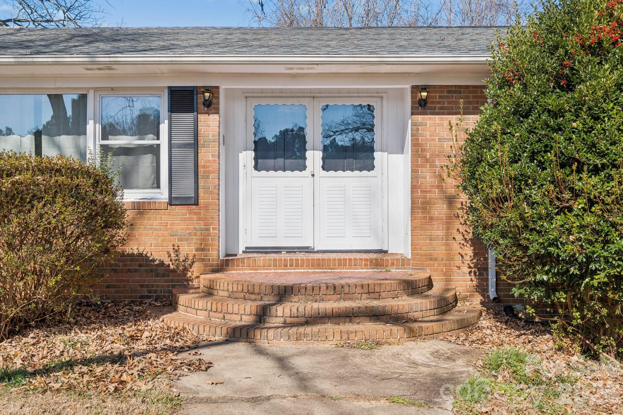 9525 Brief Road Charlotte, NC 28227 - Photo 43 of 46 a front view of a house