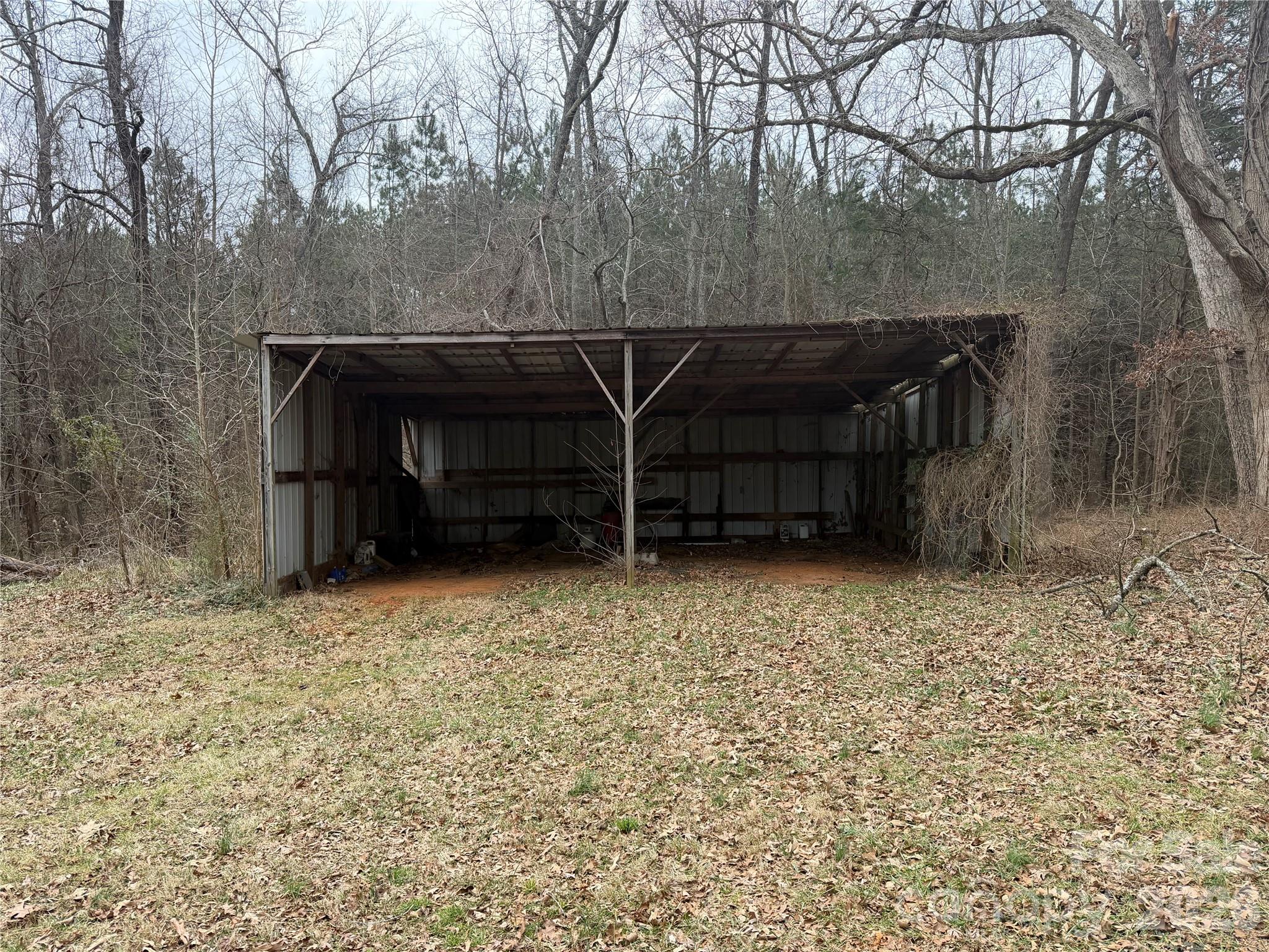 9525 Brief Road Charlotte, NC 28227 - Photo 45 of 46 a view of a house with a yard