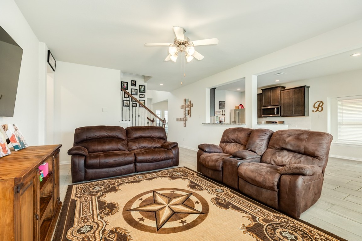 177 Bayou Bend Boulevard Angleton, TX 77515 - Photo 14 of 33 a living room with furniture and a flat screen tv