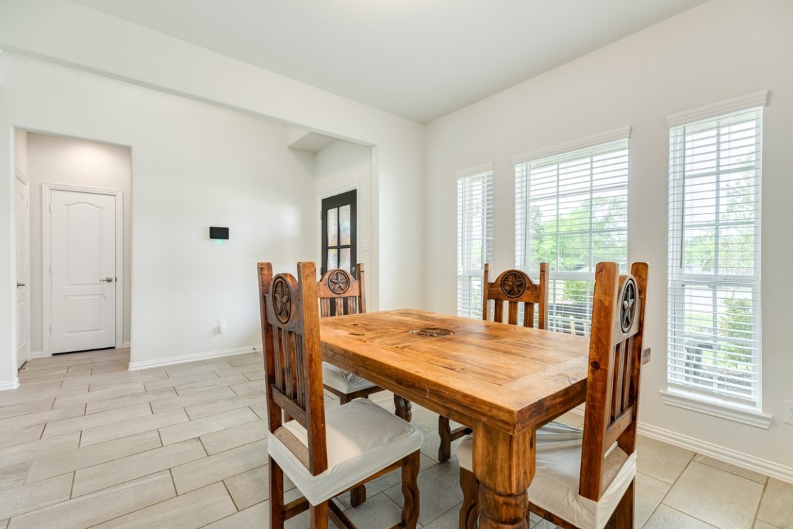 177 Bayou Bend Boulevard Angleton, TX 77515 - Photo 21 of 33 a view of a dining room with furniture and window