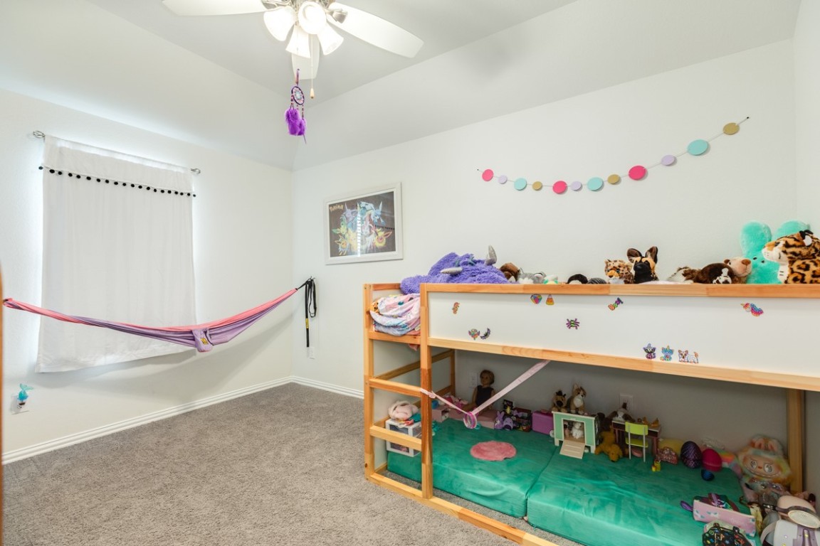 177 Bayou Bend Boulevard Angleton, TX 77515 - Photo 29 of 33 a room with toys and dresser