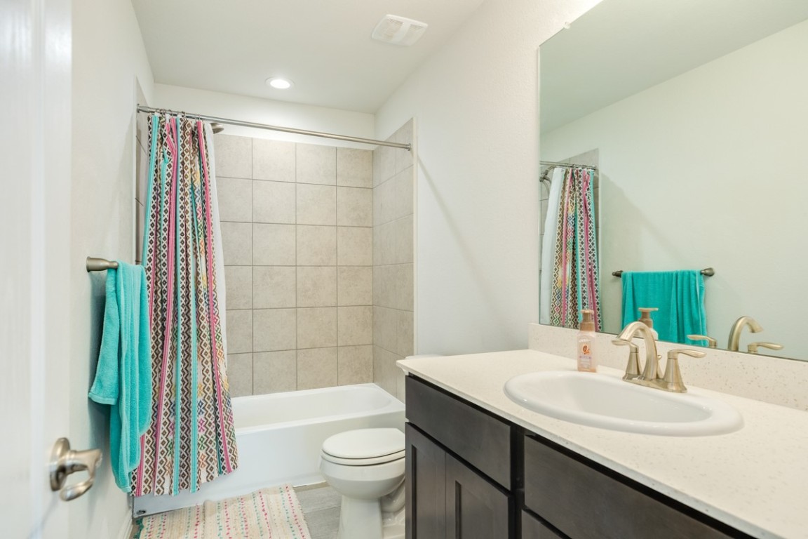 177 Bayou Bend Boulevard Angleton, TX 77515 - Photo 31 of 33 a bathroom with a sink and a mirror