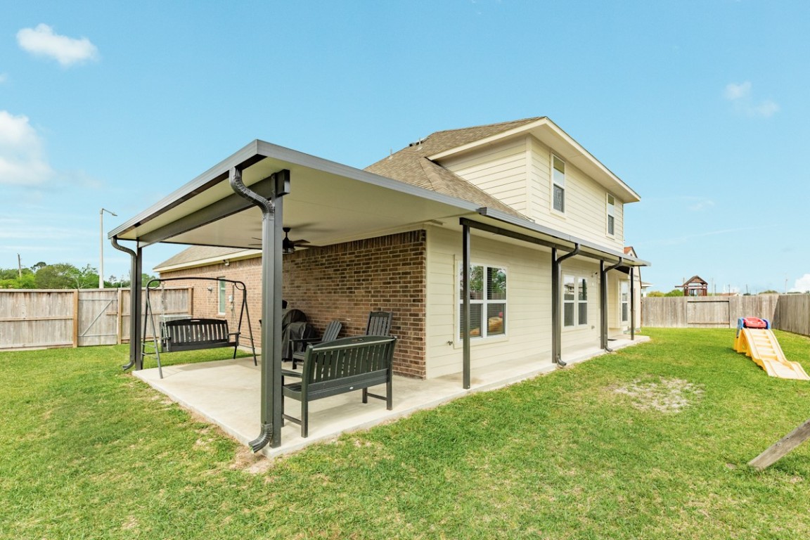 177 Bayou Bend Boulevard Angleton, TX 77515 - Photo 7 of 33 a view of a house with a yard and deck