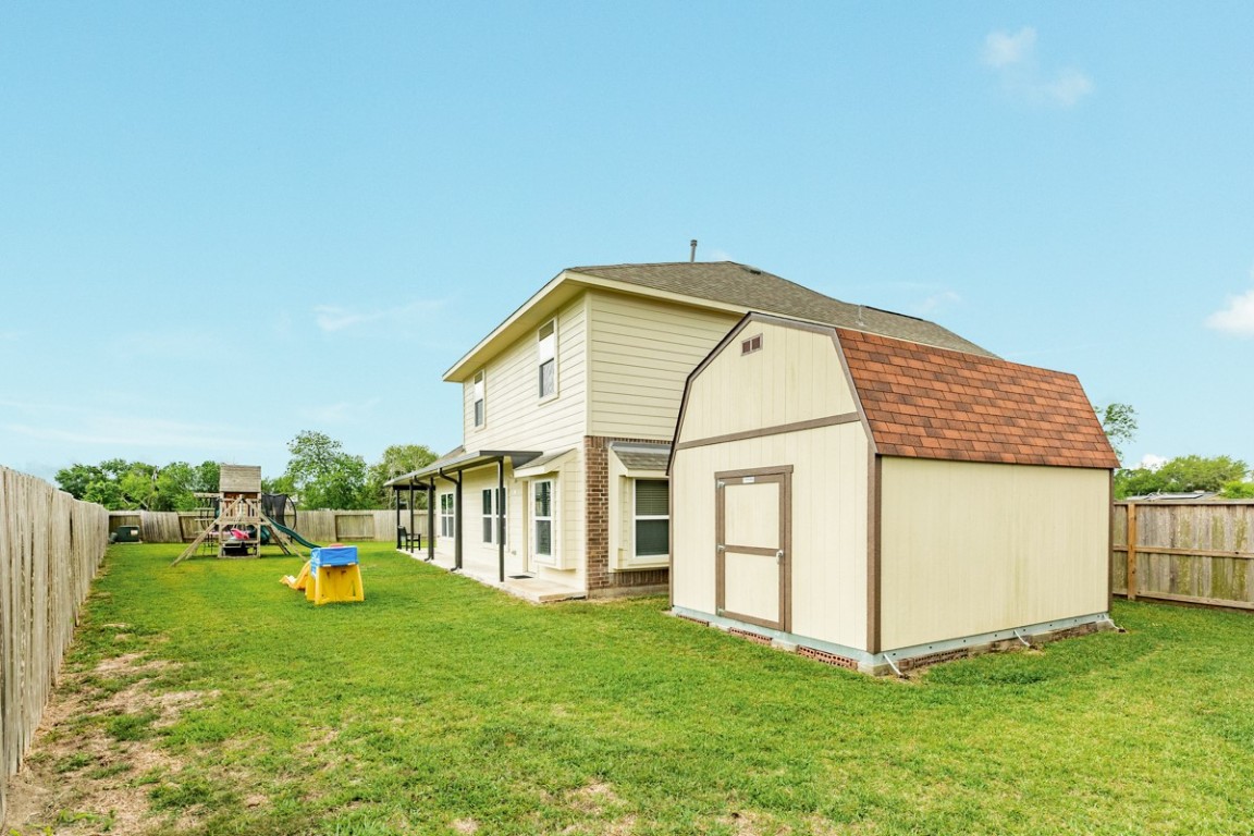 177 Bayou Bend Boulevard Angleton, TX 77515 - Photo 9 of 33 a view of a house with backyard
