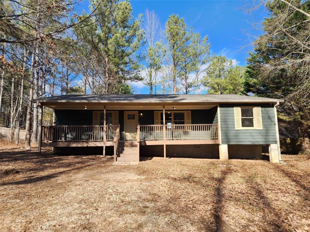 1157 Coppermine Road Buchanan, GA 30113 - Photo 1 of 1 a front view of house with a yard