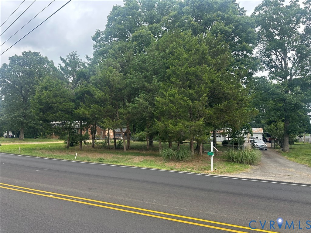9808 Reams Road North Chesterfield, VA 23236 - Photo 3 of 8 a view of a playground with a cars park