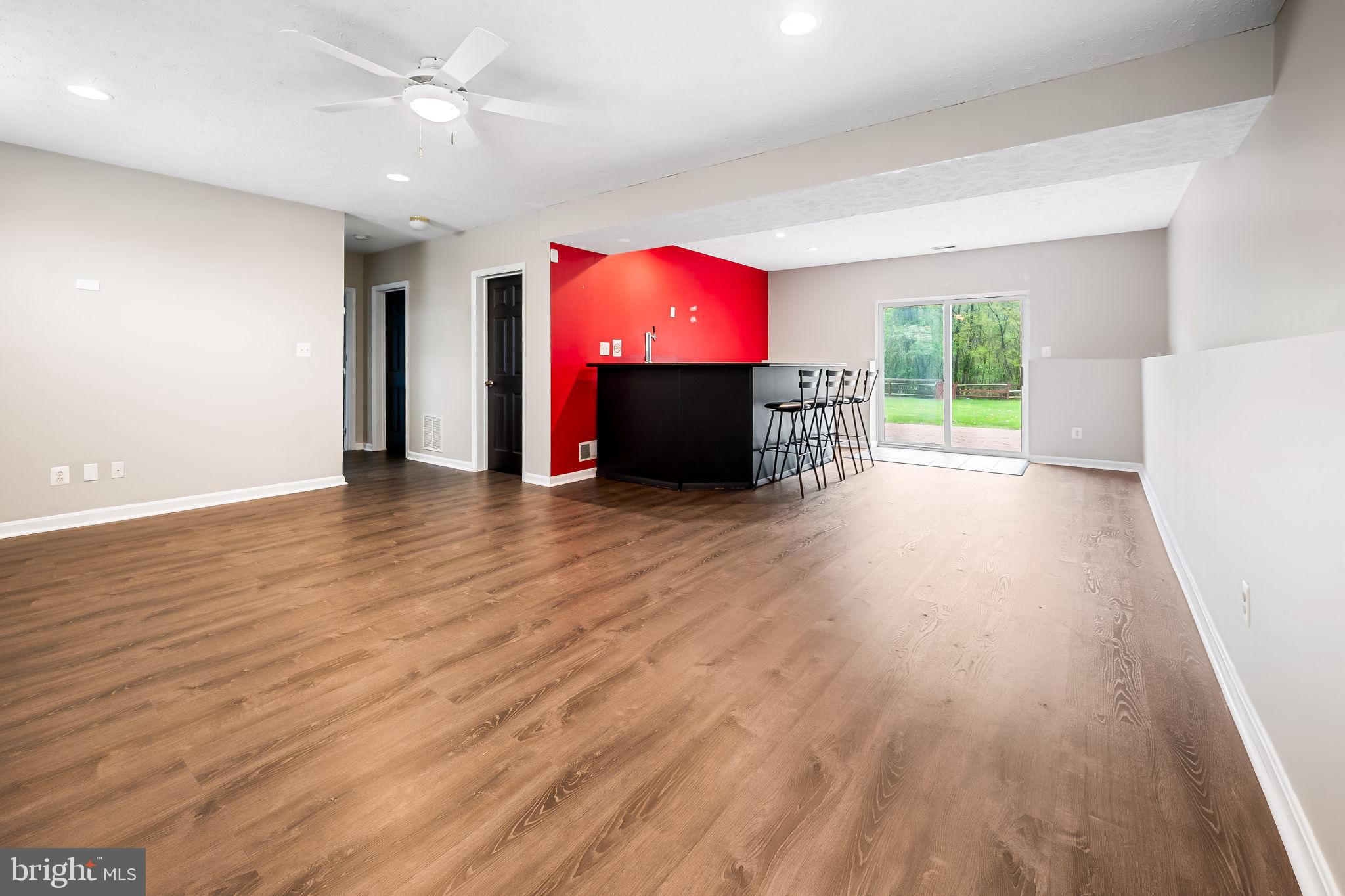 509 Silverside Road Edgewood, MD 21040 - Photo 32 of 42 Full basement view with slider door walkout