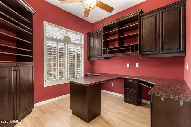 a kitchen with stainless steel appliances granite countertop a stove and a refrigerator