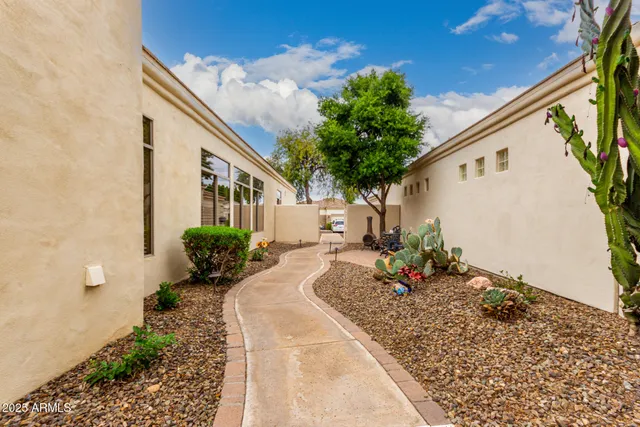a view of a dinning tables and chairs in the patio