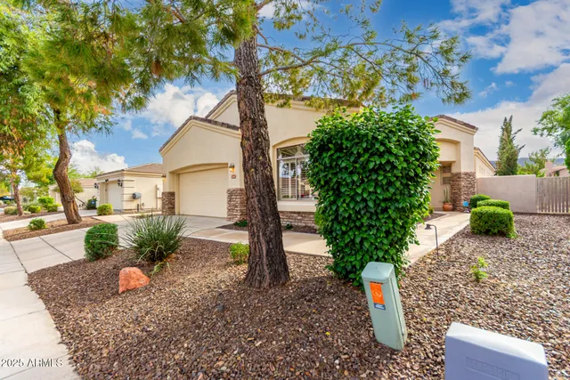 a backyard of a house with lots of green space