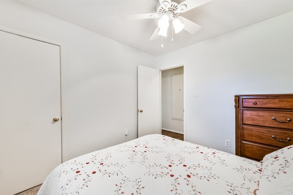 823 Townley Street Channelview, TX 77530 - Photo 20 of 29 a bedroom with a bed and a dresser