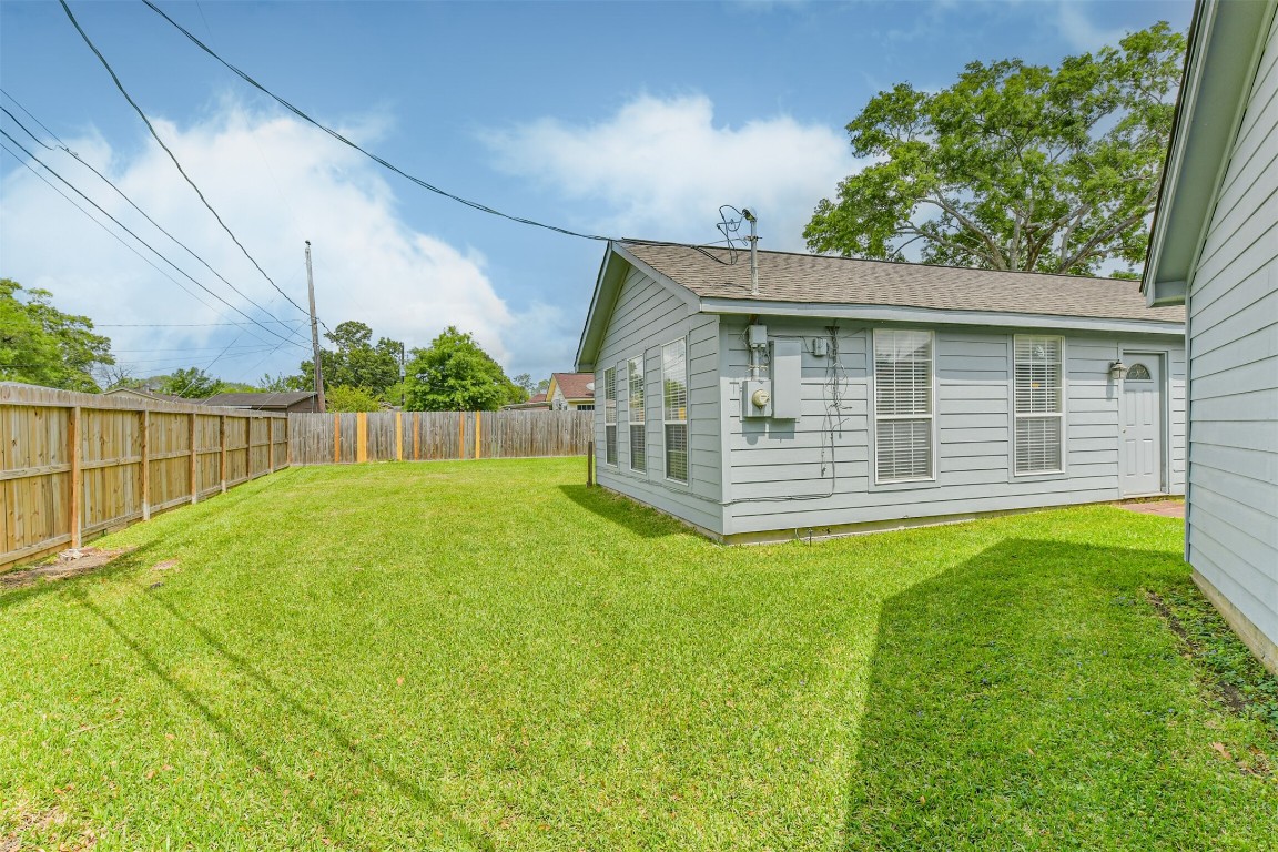 823 Townley Street Channelview, TX 77530 - Photo 28 of 29 a view of a house with backyard and porch