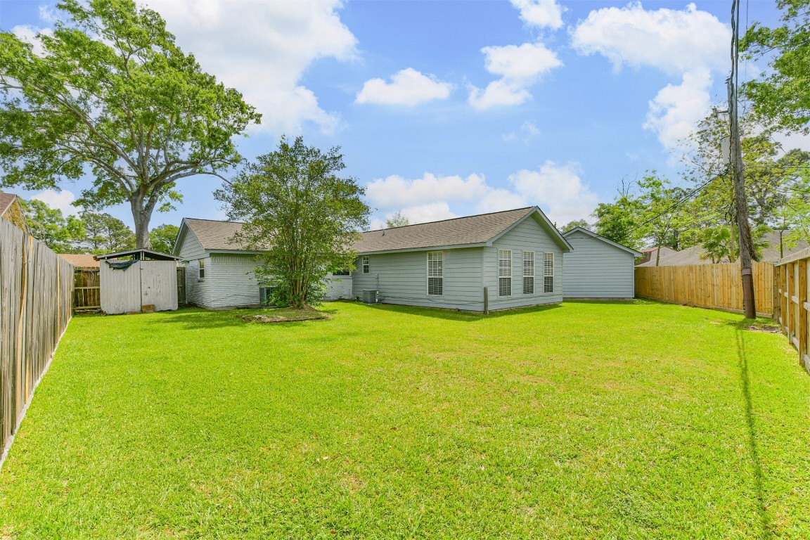 823 Townley Street Channelview, TX 77530 - Photo 29 of 29 a front view of house with yard and trees