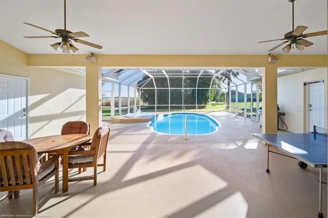 a view of a swimming pool and a porch