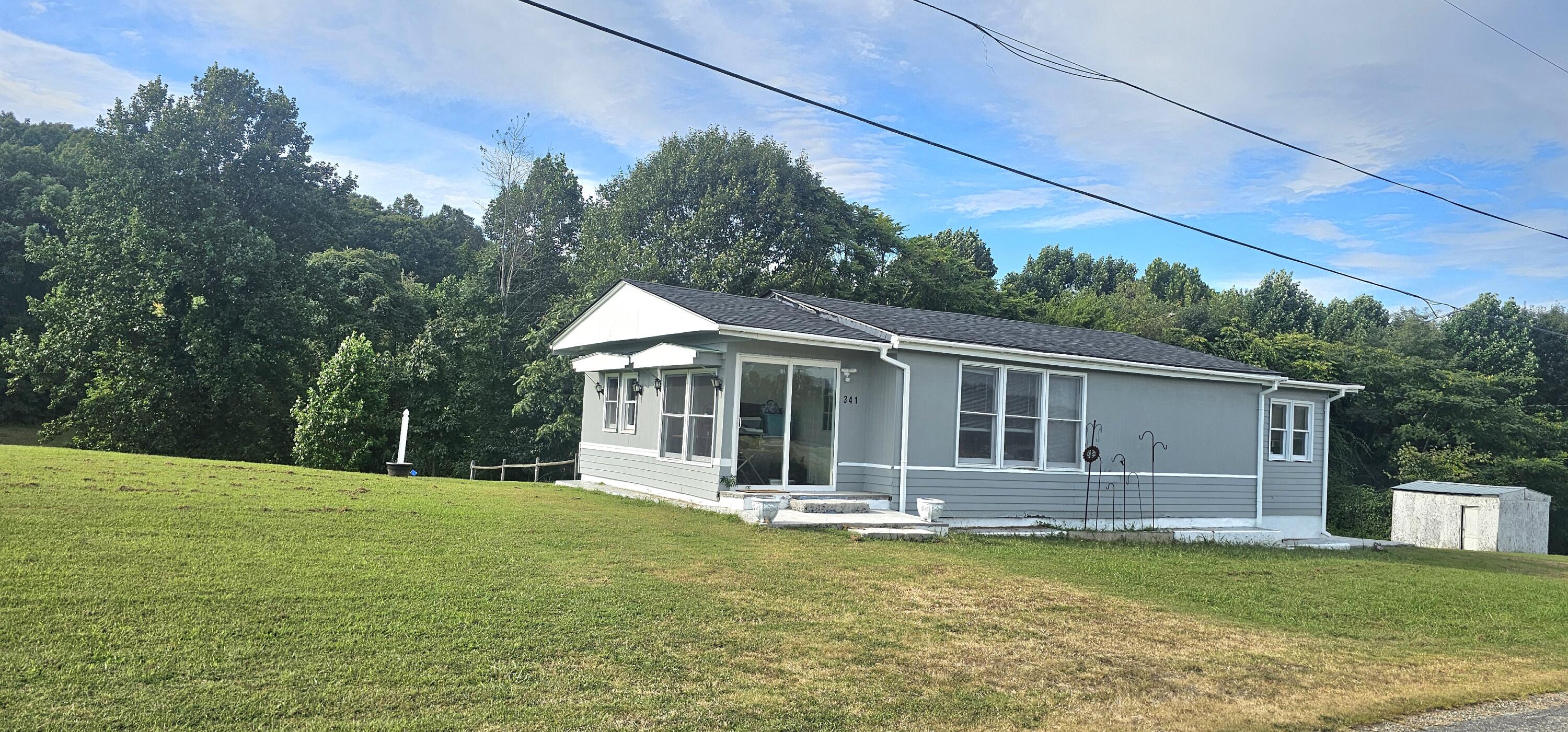 341 George Martin Drive Ridgeway, VA 24148 - Photo 2 of 11 a view of a house with backyard and porch