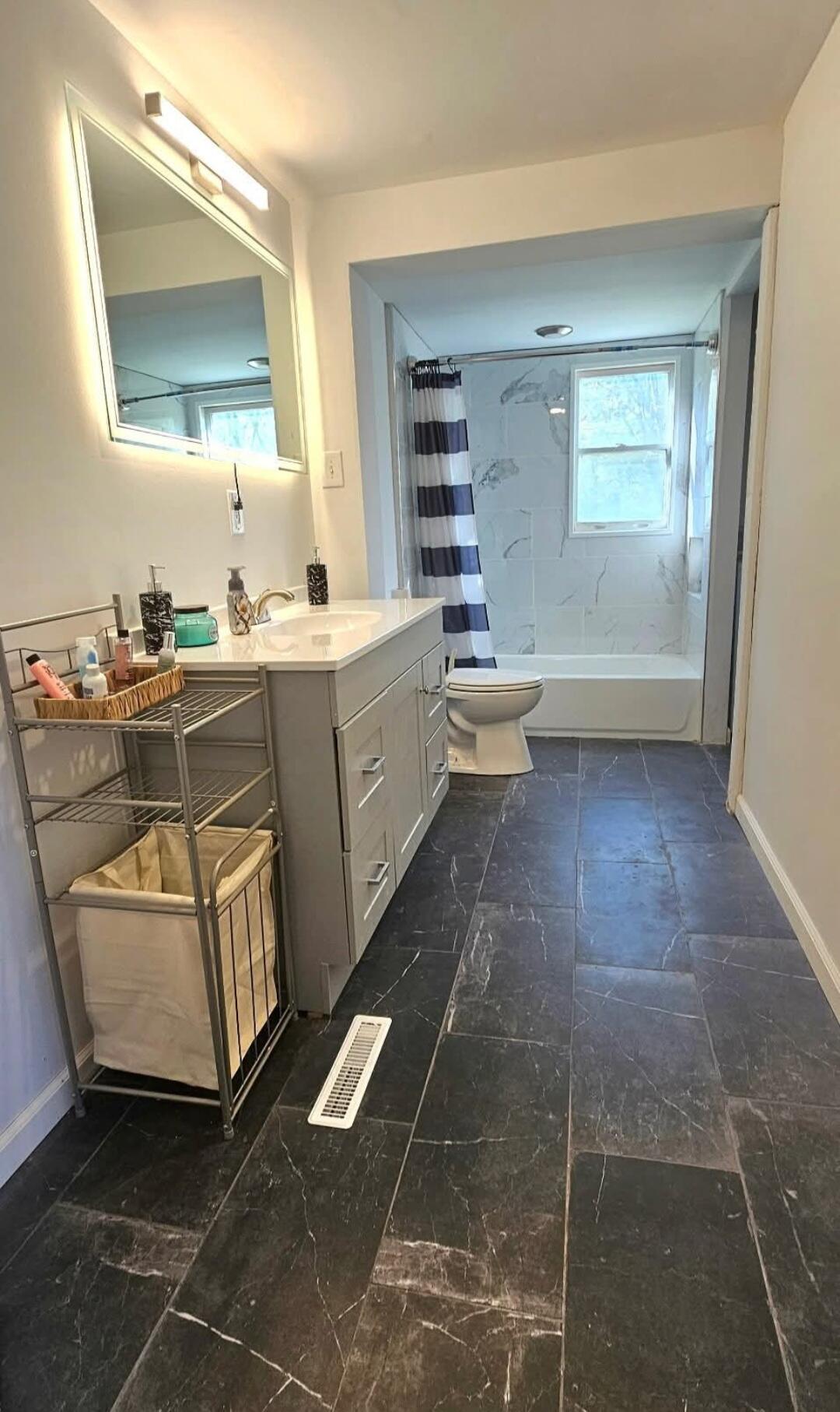 341 George Martin Drive Ridgeway, VA 24148 - Photo 7 of 11 a bathroom with a toilet sink and mirror